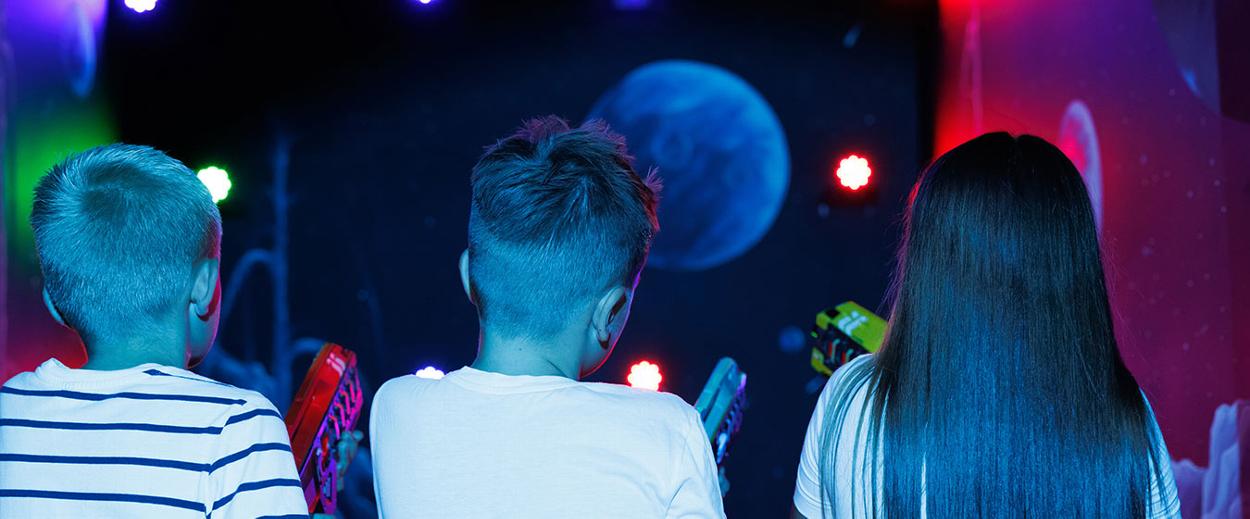 Kids playing laser quest